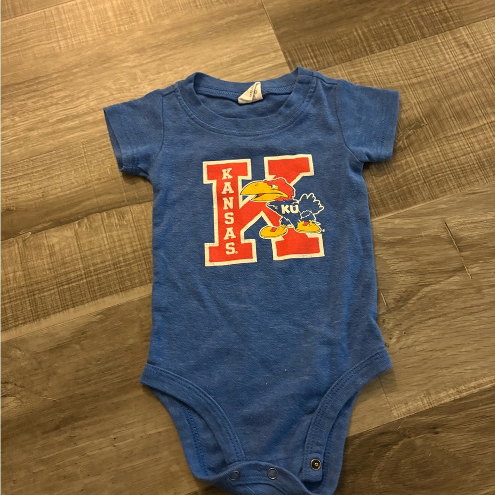 Charlie Hustle Blue Kansas Jayhawks onesie